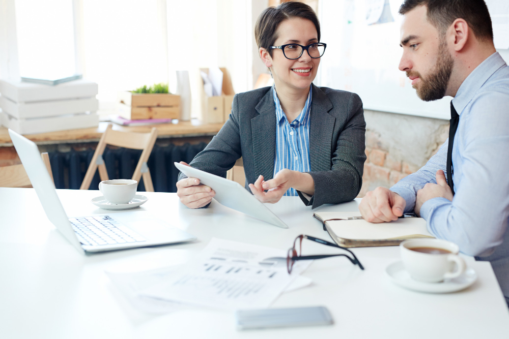 tax advisor in Glasgow showing client document